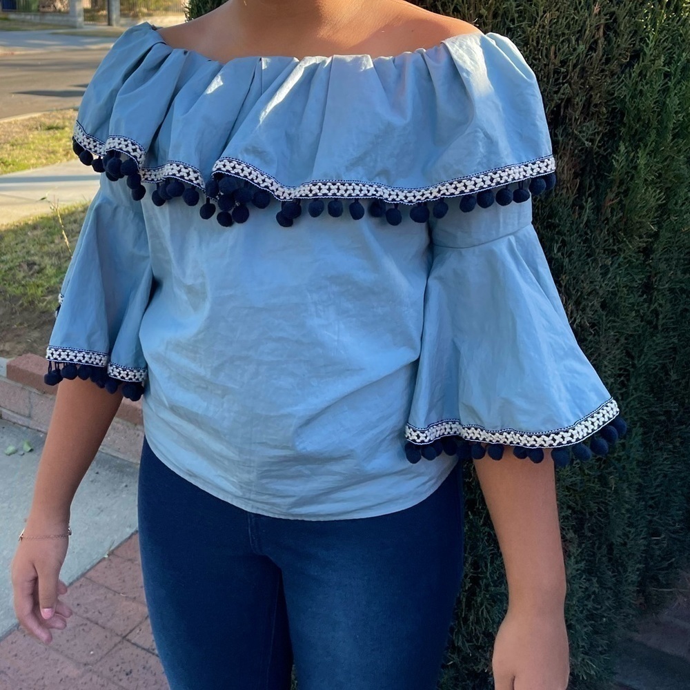 The perfect blue fun and flirty top